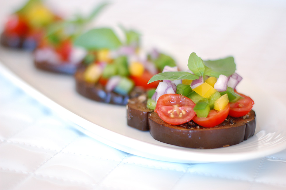The Global Girl Raw Food Recipes: Eggplant bruschetta with tomato and basil. This healthy "no bread" Italian appetizer is vegan, gluten free, and dairy free.
