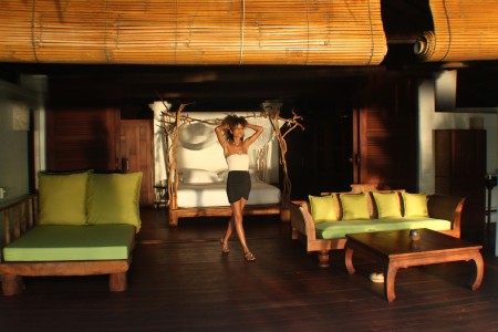 The Global Girl Travels: Ndoema greets the sunrise in her open style bedroom at Glamping Hub's eco-friendly resort in Ko Yao Noi, Southern Thailand.