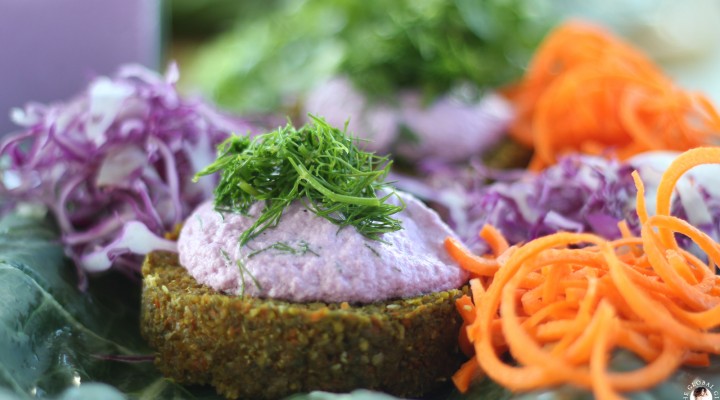 The Global Girl Raw Food Recipes: Carrot & Dill Burgers in collard green leaf with shredded red cabbage, romaine lettuce and carrots. 100% raw, vegan and gluten-free.