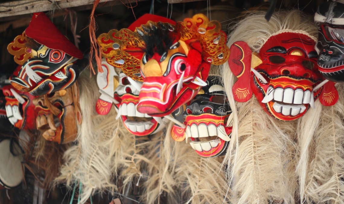 The Global Girl Travels: Balinese demon masks at Candi Kuning market in Bali, Indonesia.