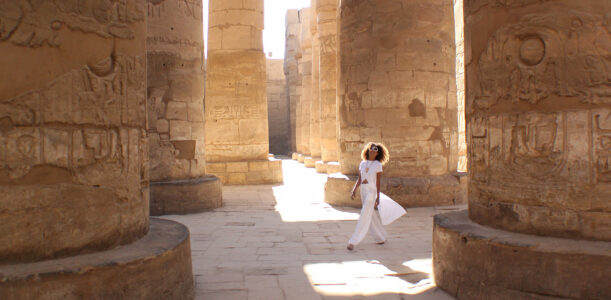 The Global Girl Daily Style: Ndoema sports the all white look at the Karnak Temple in Luxor, Egypt.
