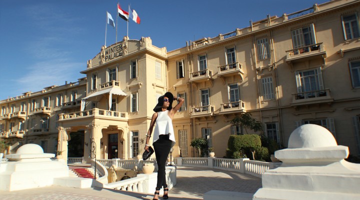 The Global Girl Travels: Ndoema sports a classic black and white hat look at the Sofitel Winter Palace Hotel in Luxor, Egypt.