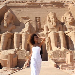 The Global Girl Travels: Ndoema arrives at the Abu Simbel temples in a white strapless maxi dress by Alexis. Photographed in Nubia, southern Egypt, near the border with Sudan.