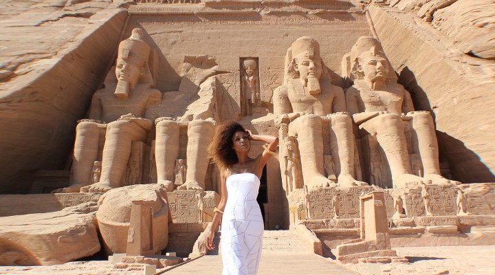 The Global Girl Travels: Ndoema arrives at the Abu Simbel temples in a white strapless maxi dress by Alexis. Photographed in Nubia, southern Egypt, near the border with Sudan.