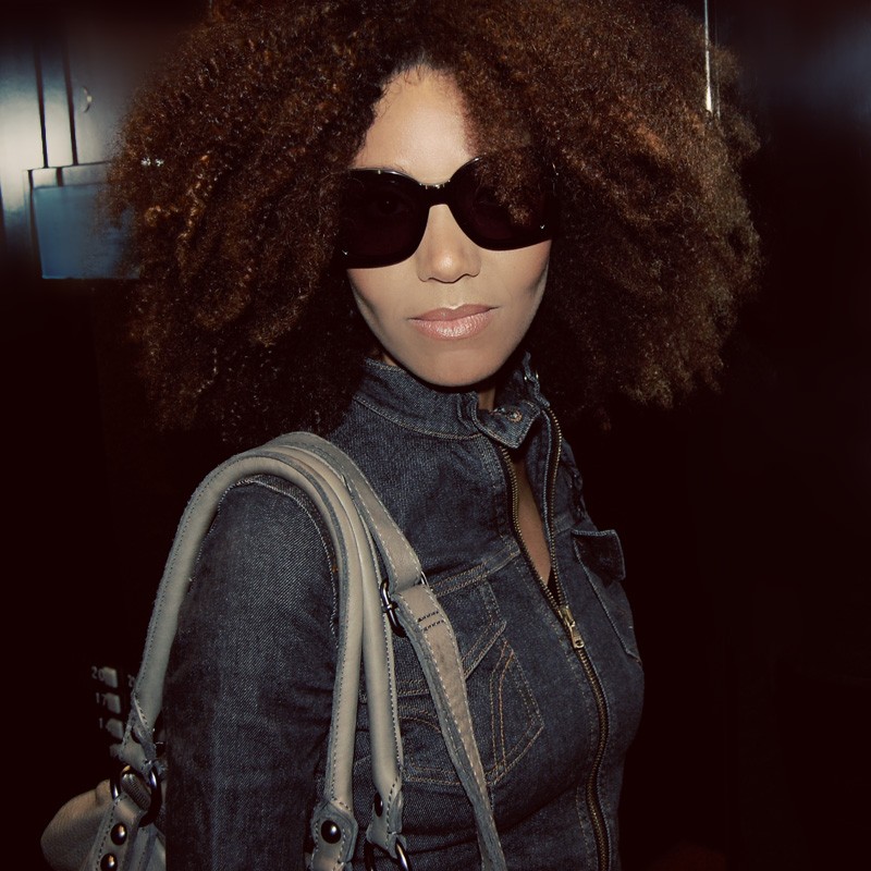 Ndoema wears Chloé sunglasses, Dolce and Gabbana cropped denim jacket, G-Star Raw skinny jeans and Linea Pelle leather bag